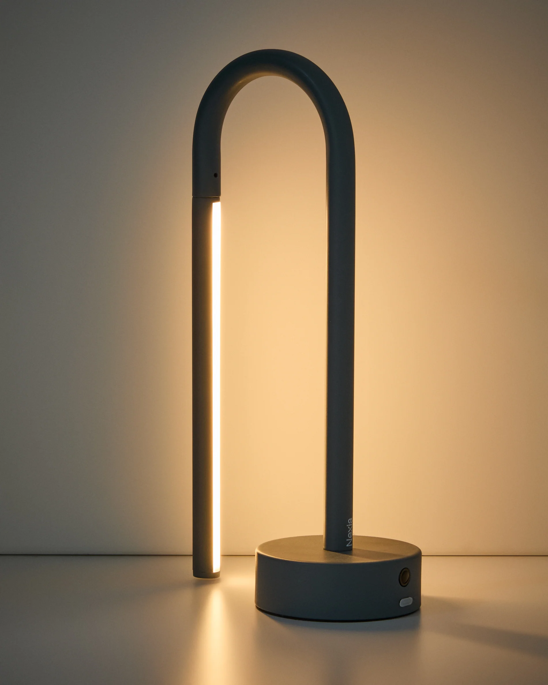 Bow blue aluminium portable table lamp