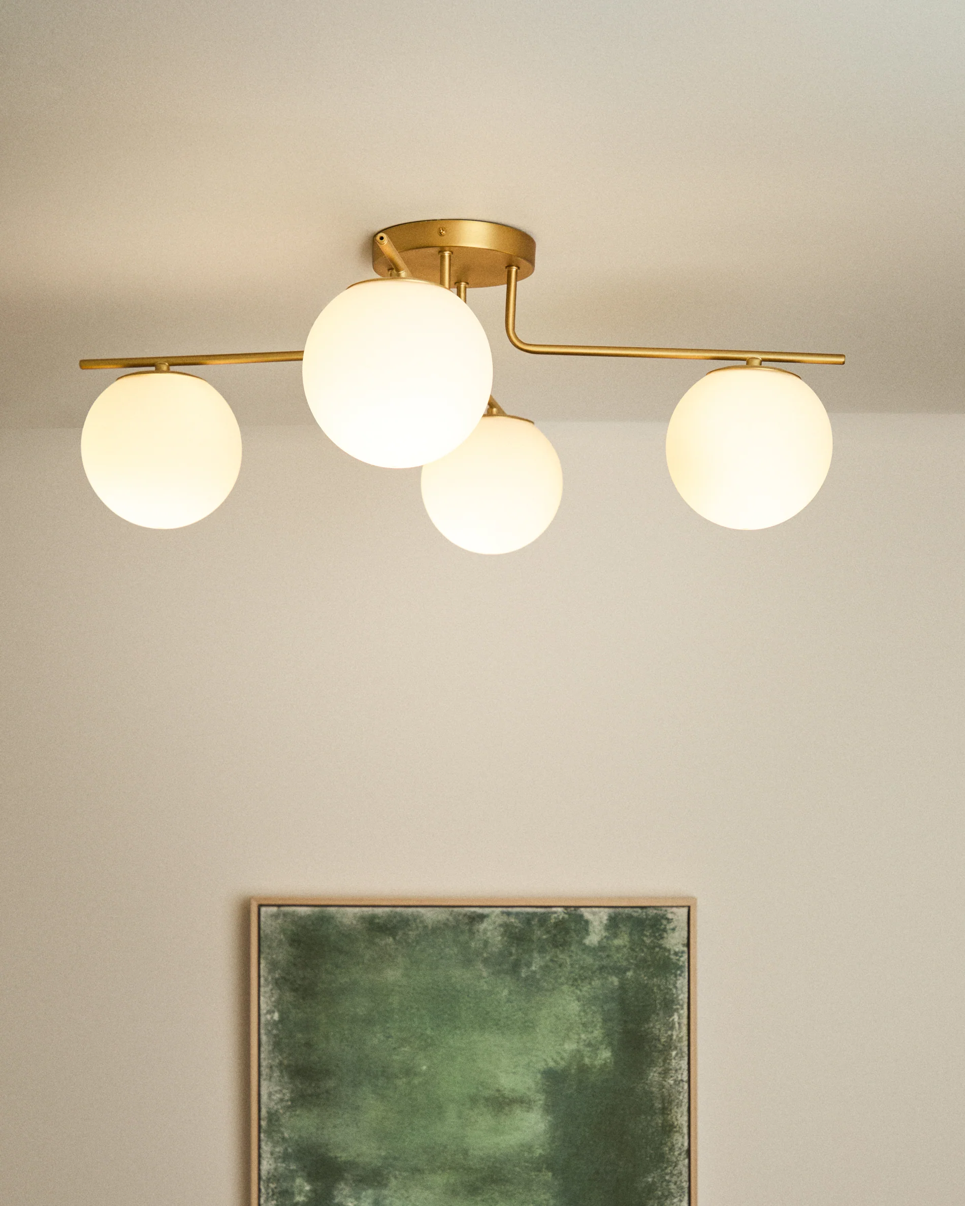 Brisia metal ceiling lamp with brushed brass finish and 4 frosted glass balls Ø15cm