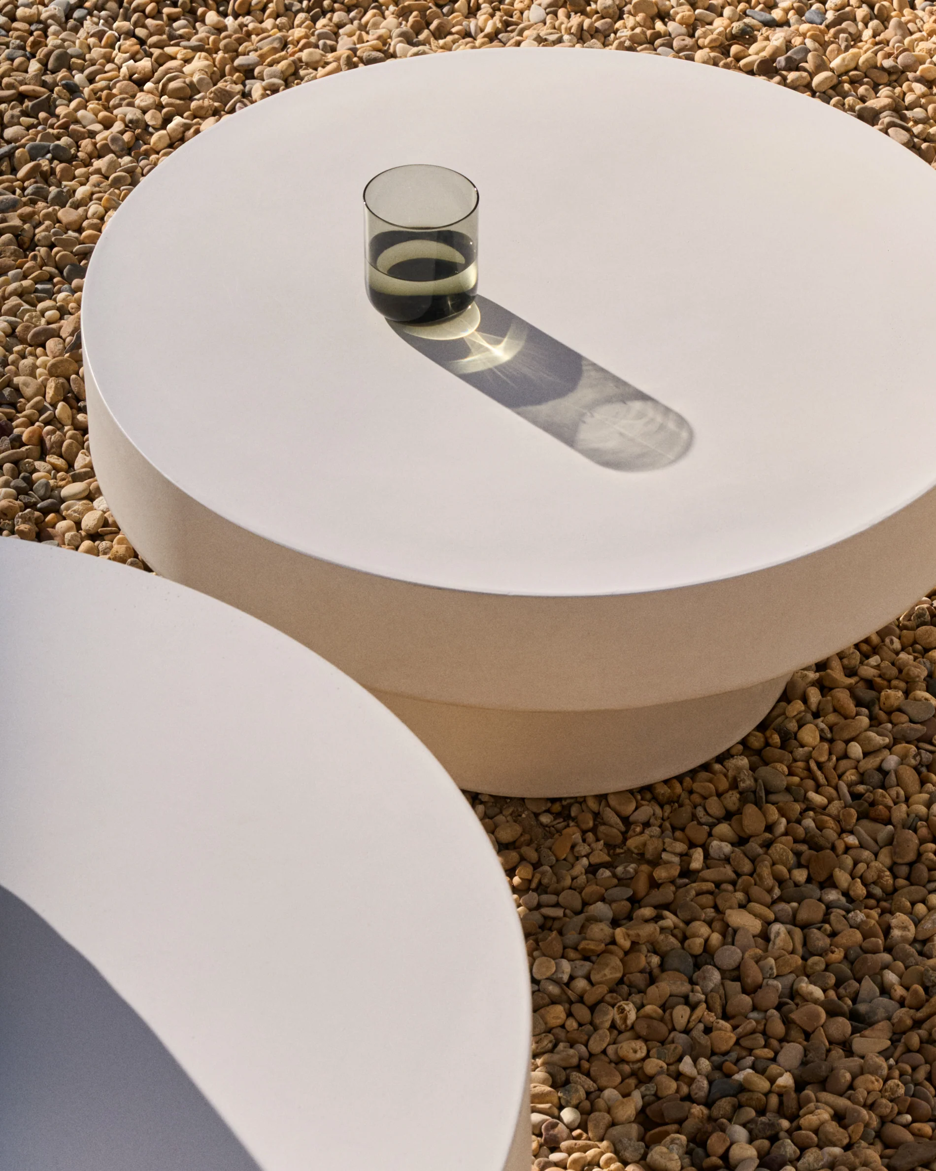 Aiguablava round coffee table in white cement, Ø 66 cm