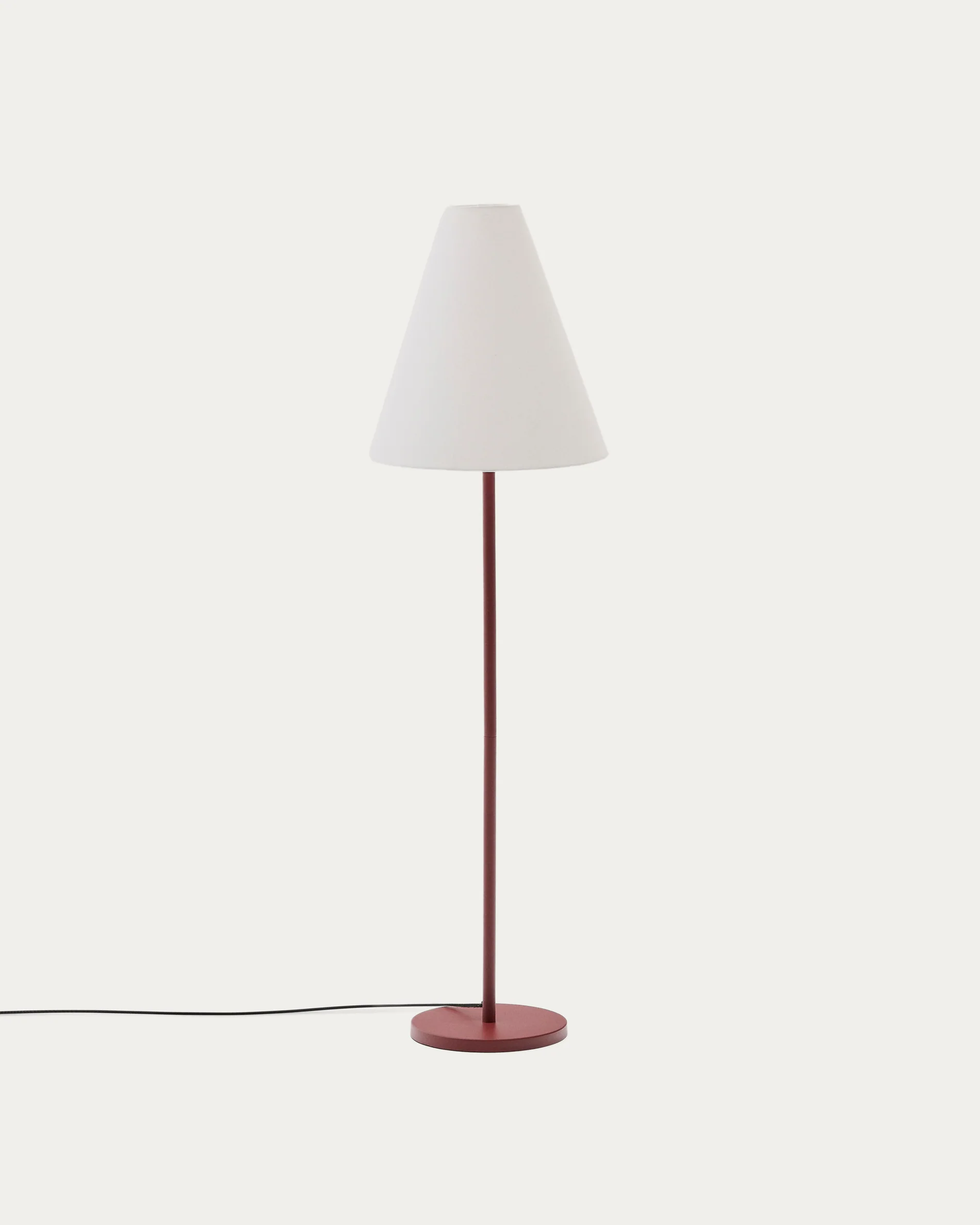 Navat floor lamp with a metal base in a terracotta painted finish