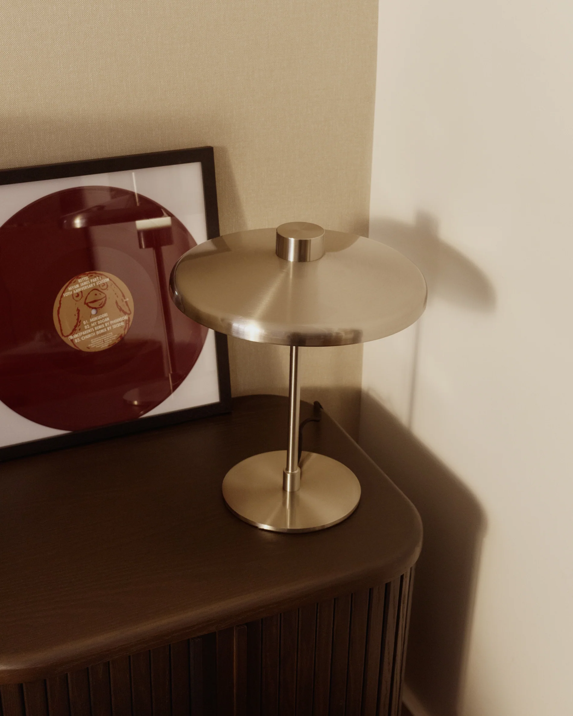 Nuvira table lamp in light grey brushed metal