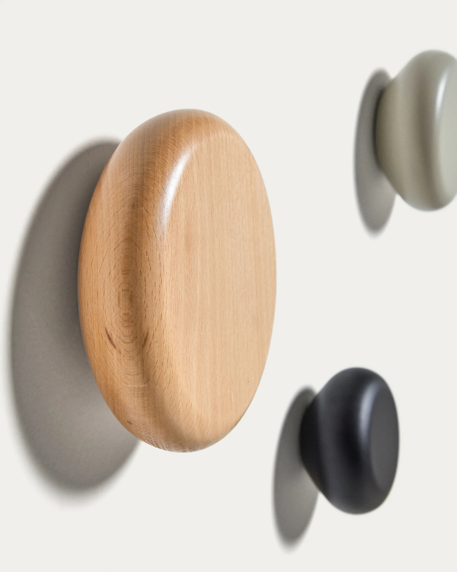 Nadue set of 3 solid beech wood wall hooks with natural, grey, and black finishes