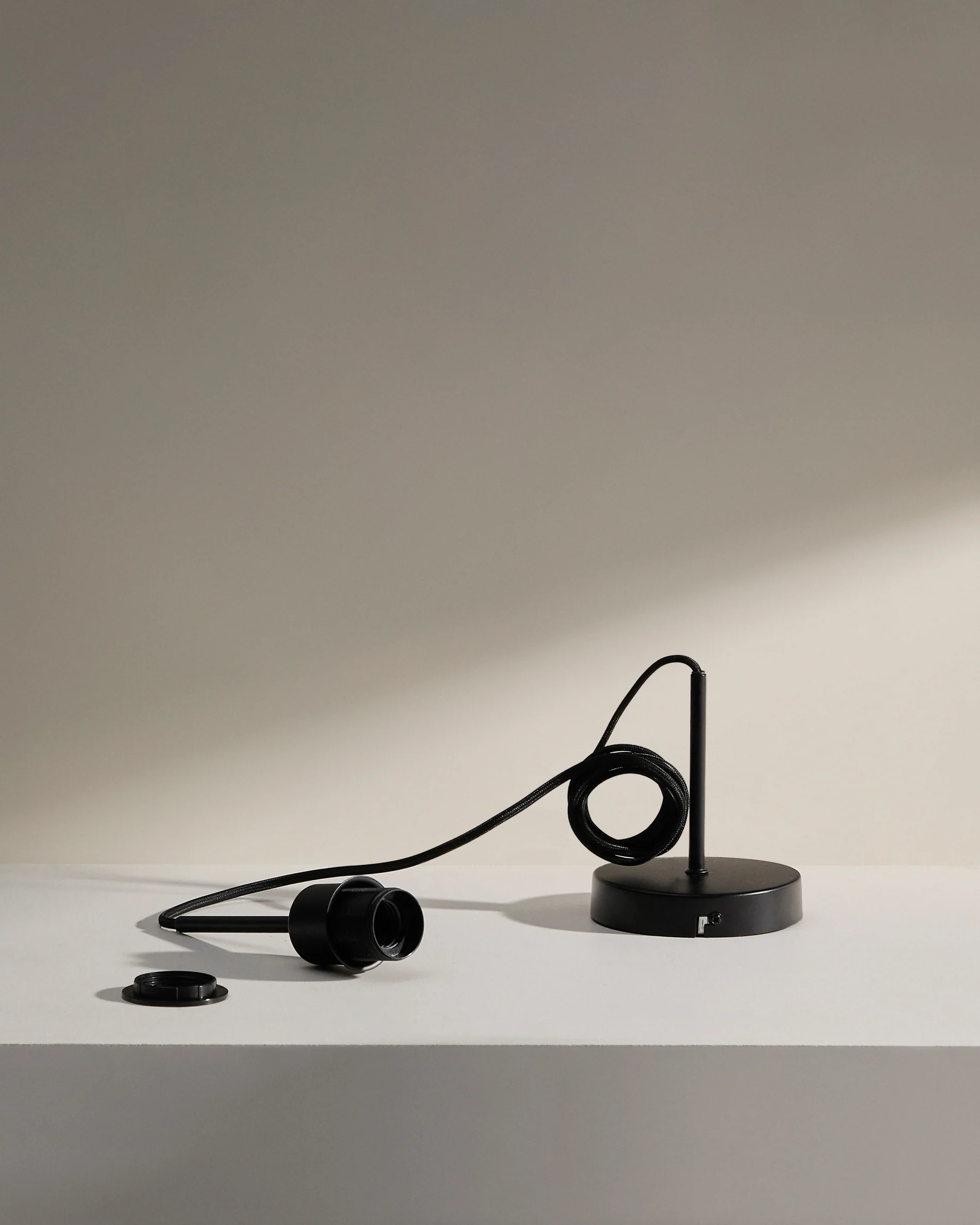 Fluvia metal lamp fittings in a black finish, 250 cm