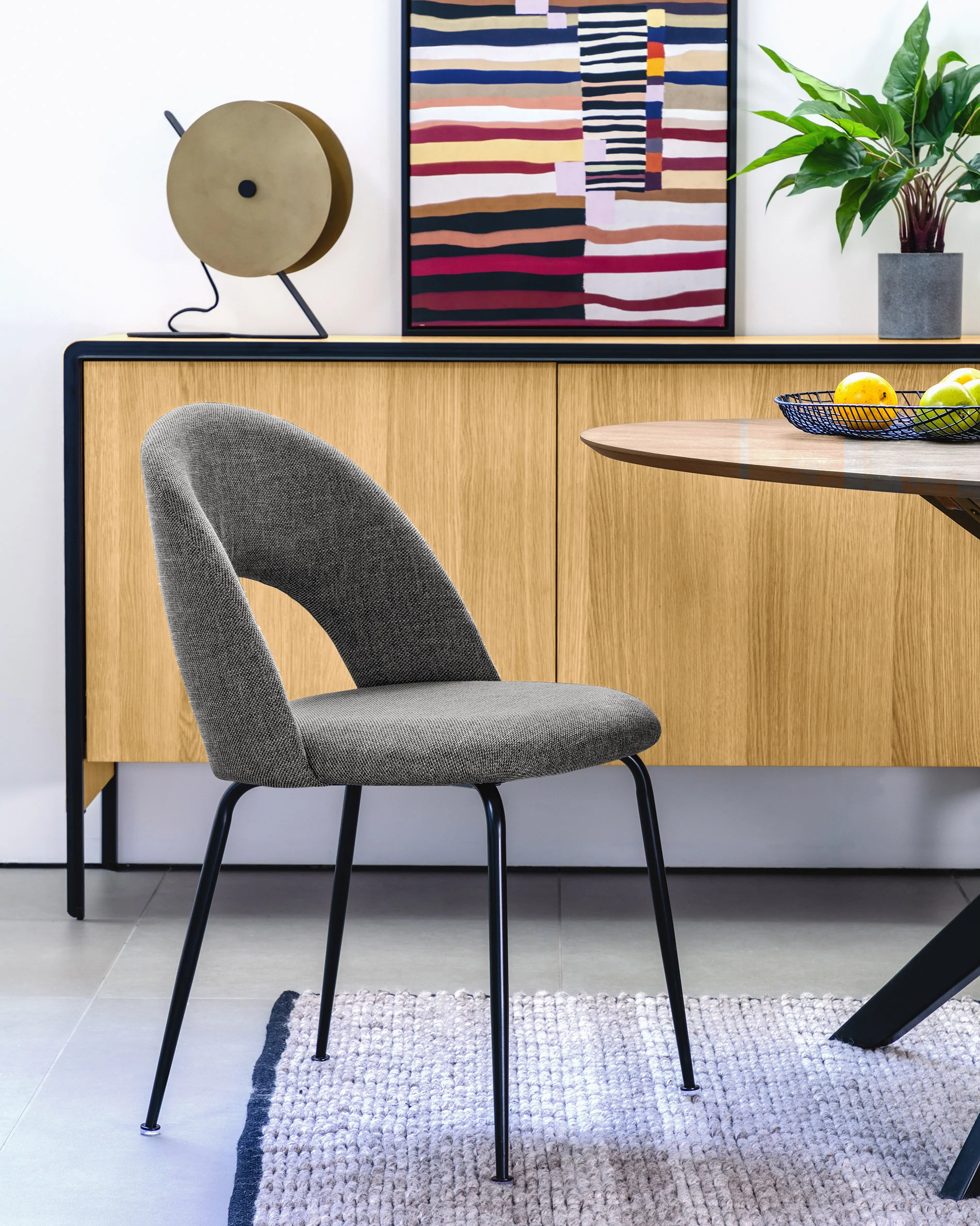 Mahalia dining chair in dark grey with steel legs, with a black painted finish FSC 100%