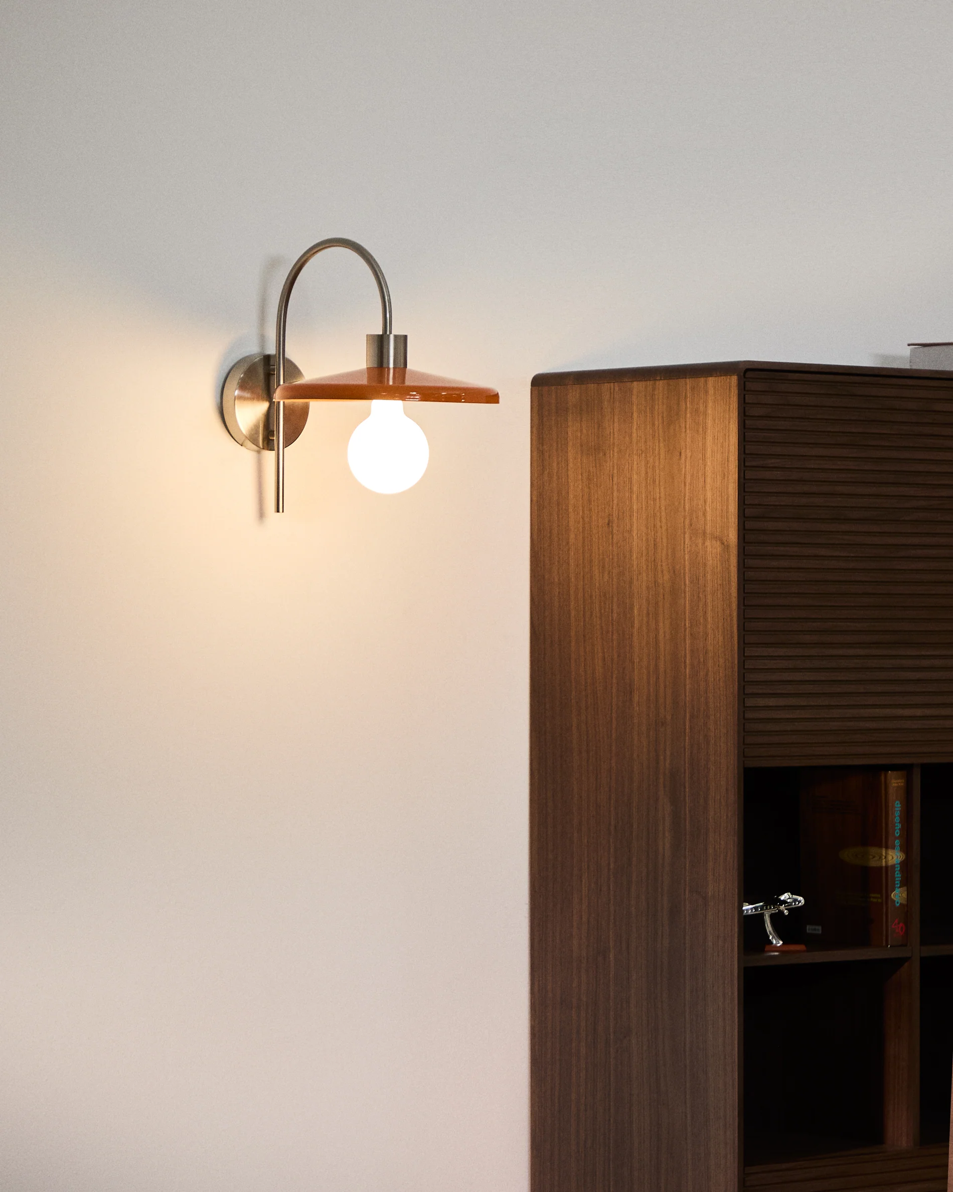 Nuvira wall light in light grey brushed metal with orange lampshade