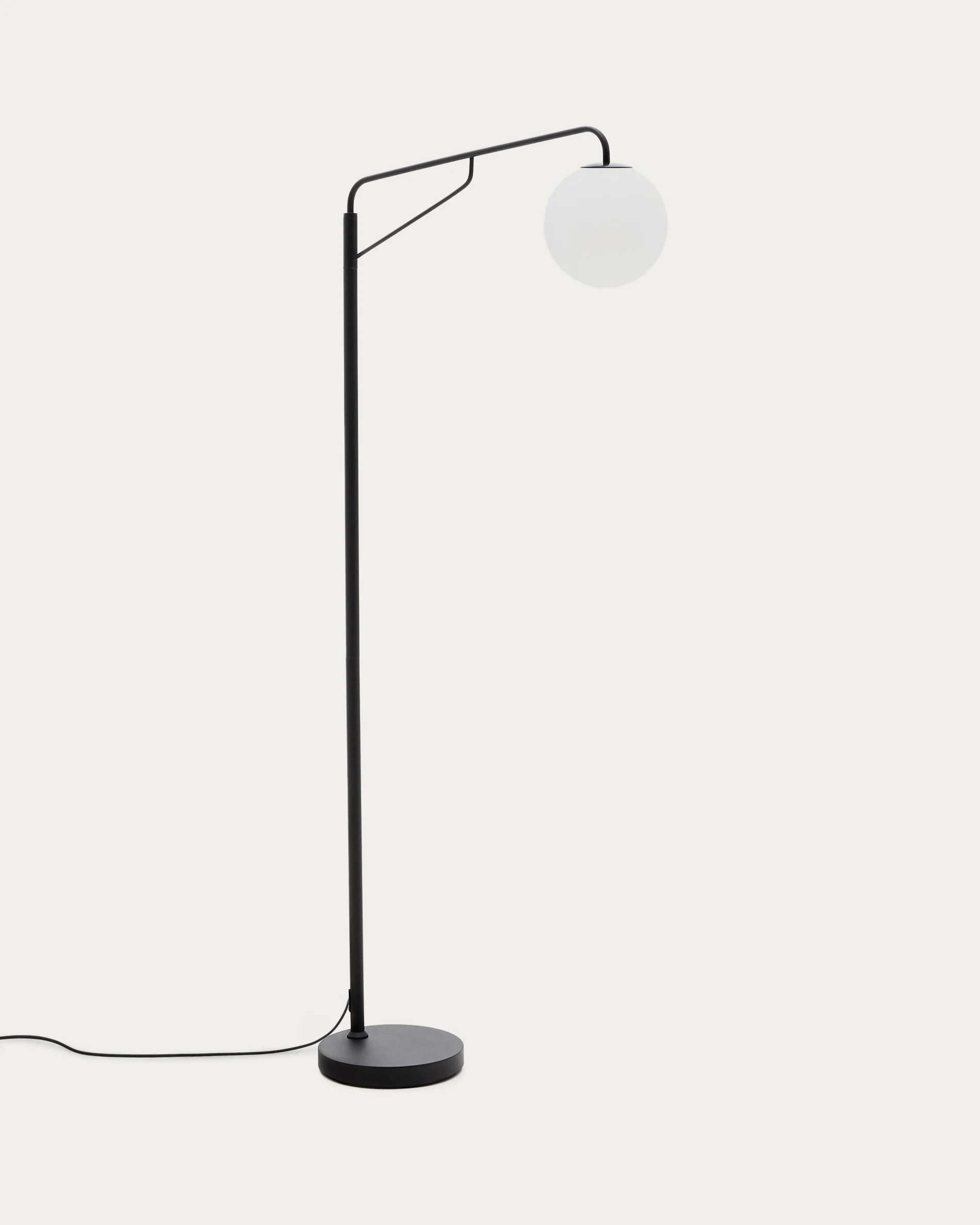 Eilo floor lamp in black steel with frosted glass globe