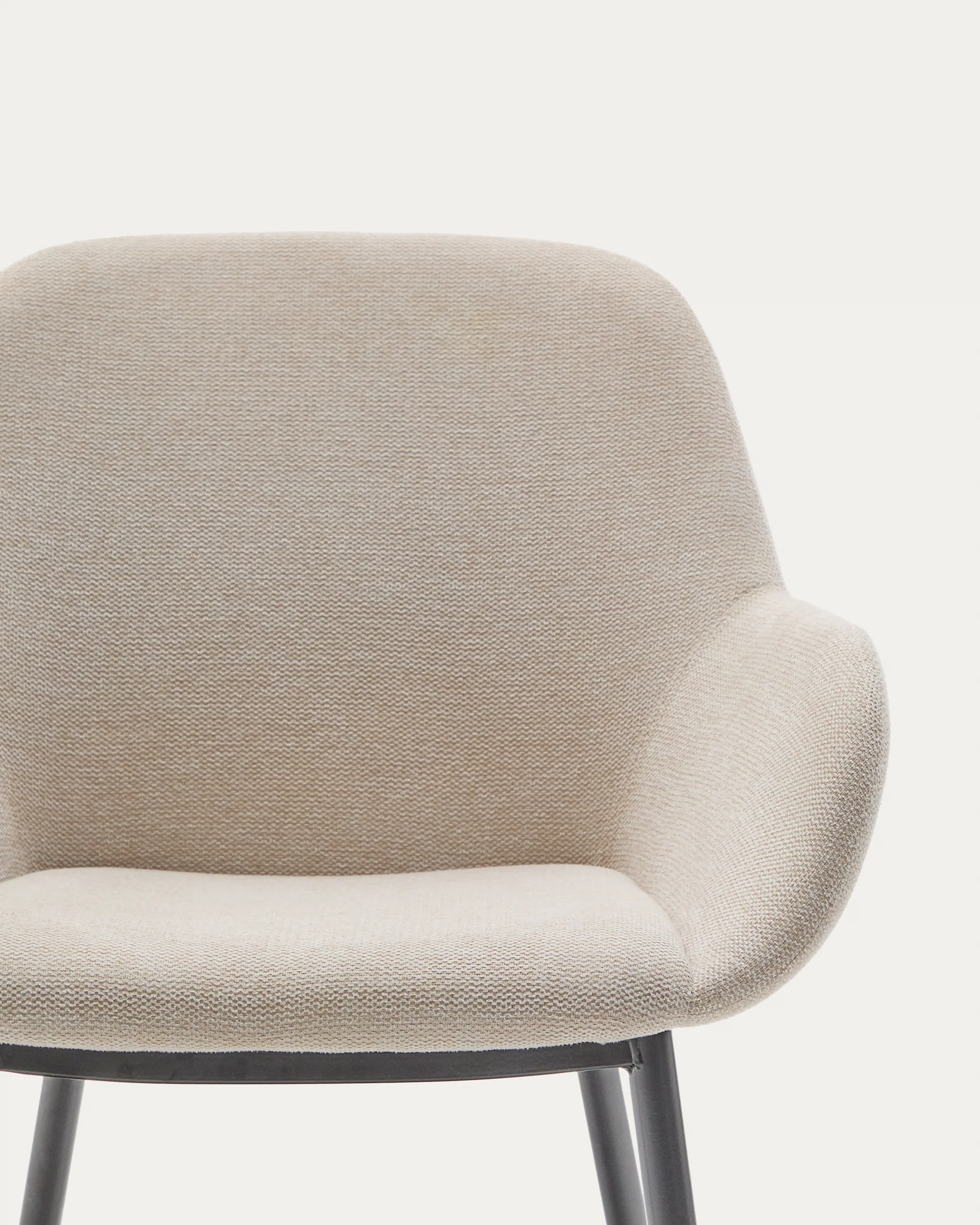 Konna chair in beige and steel legs in a painted black finish