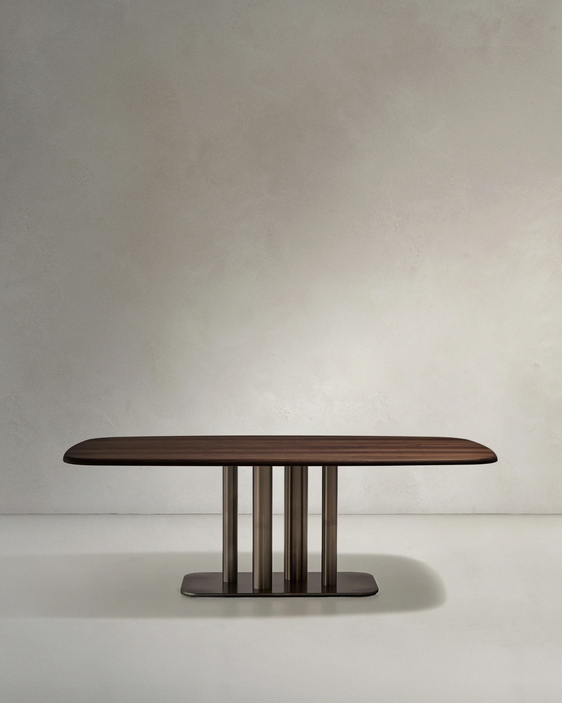 Melvar table made from walnut veneer and legs with brushed stainless steel base 180 x 100cm