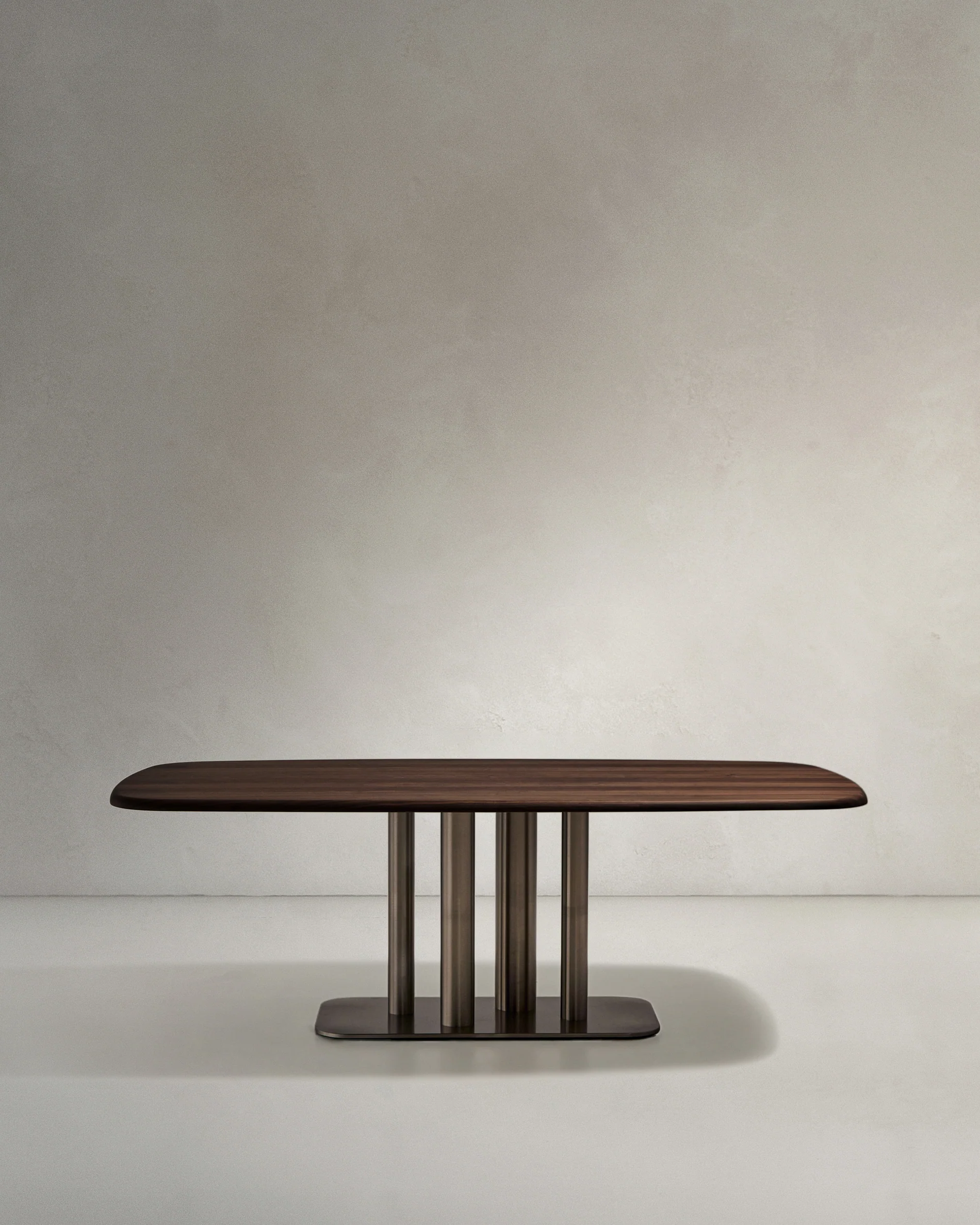 Melvar table made from walnut veneer and legs with brushed stainless steel base 220 x 110cm